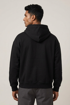 Indian model wearing Neon Wanderer hoodie, back view