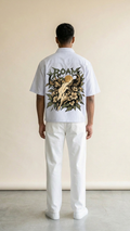 Matching model wearing the Roam Wild shirt, back view